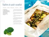 a picture of a broccoli and chicken dish in a paper bag