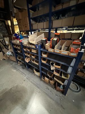 many boxes and boxes on the shelves in the warehouse