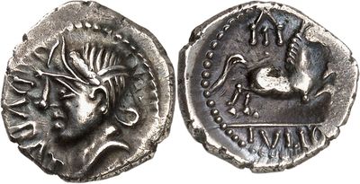 a silver coin with an image of a bird on it