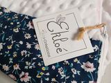 an image of a close up of a pillow with a tag on it