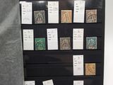 a display case with a lot of stamps on it