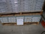 a pallet full of boxes with a sign on it