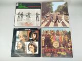 four beatles albums, including the beatles album, and the beatles album