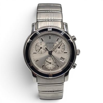 an image of a close up of a wrist watch on a white surface