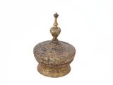 an image of a gold and silver container with a wooden top