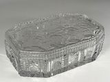 a glass box that is sitting on a table