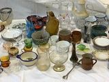 a table with a lot of glassware on it