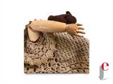 a doll that is holding onto a piece of cloth
