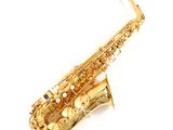 saxophone on a white surface with a white background