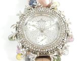 an image of a close up of a watch on a white background