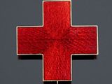 an image of a red cross on a black background