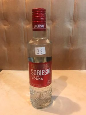 a bottle of vodka that is sitting on a table
