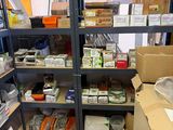 a room filled with lots of boxes and shelves