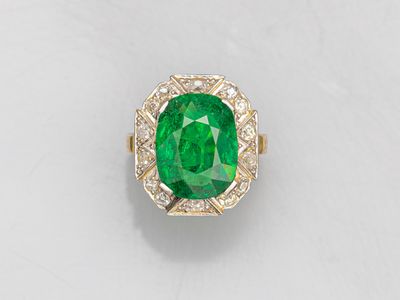 Bague en or deux tons 750°/°° (18K), sertie d'un grenat vert… - Photo 1