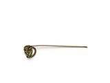 an image of a gold pin with a green stone in the middle