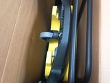 a cardboard box with a pair of wheels in it