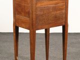 a small wooden table with a drawer on one side and a drawer on the other side
