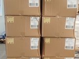 boxes stacked on top of each other in a warehouse