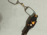 a pair of glasses and a pair of scissors on a table