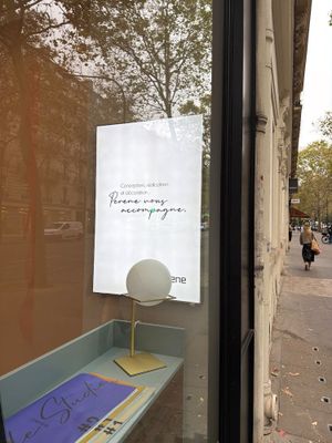 a sign in the window of a store that says, i am sorry