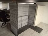 an image of a cubicle with a chair in it