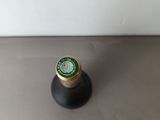 a spool of thread sitting on top of a table