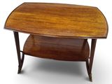 a wooden coffee table with a shelf on top of it