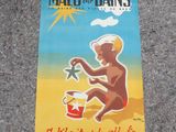 un panneau posé par terre sur lequel on peut lire « malo de bains »