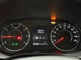 a close up of a car dashboard with a speedometer and gauges