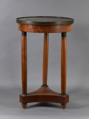 a wooden table with a black top and two wooden legs