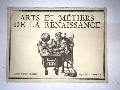 une pancarte accrochée au mur sur laquelle on peut lire « Arts et Métiers de la Renaissance »