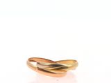 an image of a close up of a gold ring on a white surface