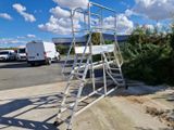 a ladder that is sitting on the side of the road