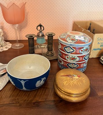 a wooden table topped with a bowl and other items