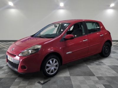 a picture of a red car parked in a garage