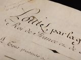 a close up of a piece of paper with writing on it