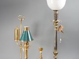 three different types of lamps and a lamp shade on a gray background