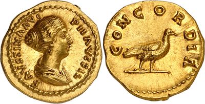 a gold coin with an image of a woman and a bird on it