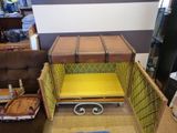 a suitcase that is sitting inside of a box