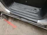 a close up of a car door with the door handle open