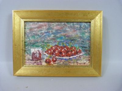 une photo d'un tableau représentant des cerises, dans un cadre doré