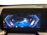 the dashboard of a car with a digital display on it
