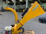 an image of a small wood chipper on a pallet in a warehouse