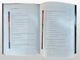 a book open to a page with a poem on it
