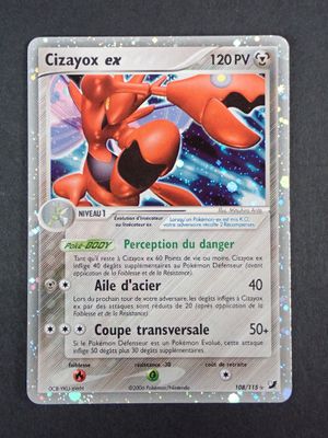 gros plan d'une carte pokemon sur une table