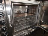 an image of a toaster oven with the door open