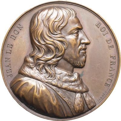 une image montrant un gros plan d'une médaille sur fond blanc