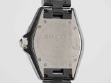 a close up of a wrist watch with a black bracelet