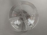 a glass plate with a chain around it