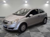 a picture of a silver car parked in a garage